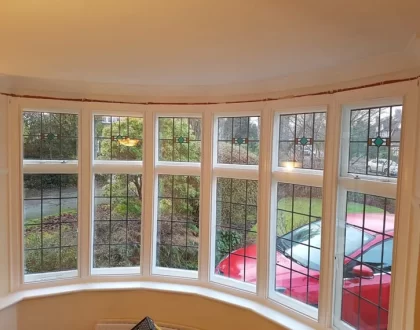 Curved bay window with secondary glazing