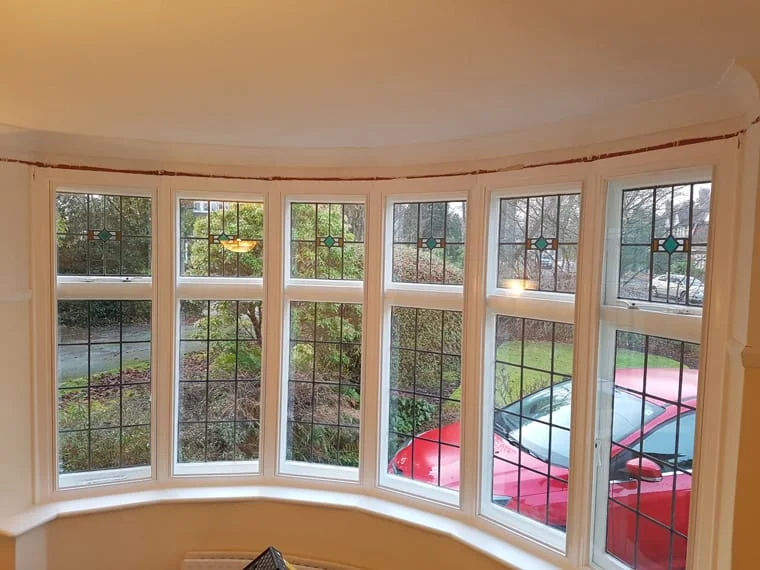Curved bay window with secondary glazing